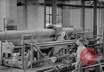 Image of Army artillery being repaired and reconditioned in a factory United States USA, 1945, second 57 stock footage video 65675076676