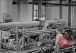 Image of Army artillery being repaired and reconditioned in a factory United States USA, 1945, second 61 stock footage video 65675076676