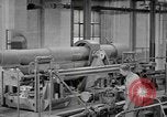 Image of Army artillery being repaired and reconditioned in a factory United States USA, 1945, second 62 stock footage video 65675076676