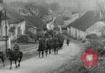 Image of AEF artillerymen moving through a French Village France, 1918, second 3 stock footage video 65675076714