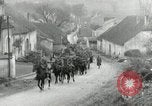 Image of AEF artillerymen moving through a French Village France, 1918, second 5 stock footage video 65675076714