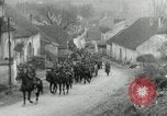 Image of AEF artillerymen moving through a French Village France, 1918, second 6 stock footage video 65675076714