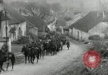 Image of AEF artillerymen moving through a French Village France, 1918, second 7 stock footage video 65675076714