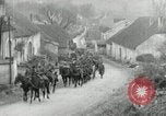 Image of AEF artillerymen moving through a French Village France, 1918, second 8 stock footage video 65675076714
