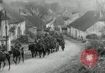 Image of AEF artillerymen moving through a French Village France, 1918, second 10 stock footage video 65675076714
