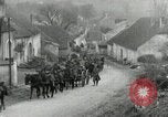 Image of AEF artillerymen moving through a French Village France, 1918, second 12 stock footage video 65675076714