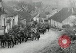 Image of AEF artillerymen moving through a French Village France, 1918, second 14 stock footage video 65675076714