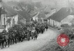 Image of AEF artillerymen moving through a French Village France, 1918, second 15 stock footage video 65675076714