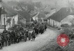 Image of AEF artillerymen moving through a French Village France, 1918, second 16 stock footage video 65675076714
