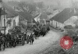 Image of AEF artillerymen moving through a French Village France, 1918, second 17 stock footage video 65675076714