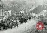 Image of AEF artillerymen moving through a French Village France, 1918, second 18 stock footage video 65675076714