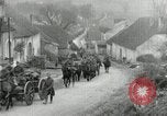 Image of AEF artillerymen moving through a French Village France, 1918, second 19 stock footage video 65675076714