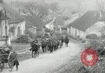 Image of AEF artillerymen moving through a French Village France, 1918, second 21 stock footage video 65675076714