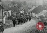 Image of AEF artillerymen moving through a French Village France, 1918, second 22 stock footage video 65675076714