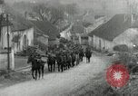 Image of AEF artillerymen moving through a French Village France, 1918, second 23 stock footage video 65675076714