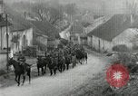 Image of AEF artillerymen moving through a French Village France, 1918, second 25 stock footage video 65675076714