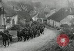Image of AEF artillerymen moving through a French Village France, 1918, second 26 stock footage video 65675076714