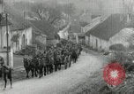 Image of AEF artillerymen moving through a French Village France, 1918, second 27 stock footage video 65675076714