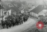 Image of AEF artillerymen moving through a French Village France, 1918, second 29 stock footage video 65675076714