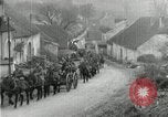 Image of AEF artillerymen moving through a French Village France, 1918, second 30 stock footage video 65675076714