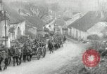 Image of AEF artillerymen moving through a French Village France, 1918, second 31 stock footage video 65675076714
