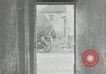 Image of AEF artillerymen moving through a French Village France, 1918, second 34 stock footage video 65675076714
