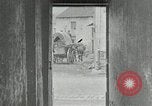 Image of AEF artillerymen moving through a French Village France, 1918, second 35 stock footage video 65675076714