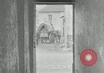 Image of AEF artillerymen moving through a French Village France, 1918, second 36 stock footage video 65675076714