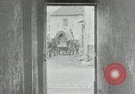 Image of AEF artillerymen moving through a French Village France, 1918, second 37 stock footage video 65675076714