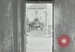 Image of AEF artillerymen moving through a French Village France, 1918, second 38 stock footage video 65675076714