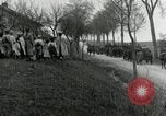 Image of AEF artillerymen moving through a French Village France, 1918, second 41 stock footage video 65675076714