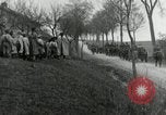 Image of AEF artillerymen moving through a French Village France, 1918, second 42 stock footage video 65675076714