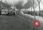 Image of AEF artillerymen moving through a French Village France, 1918, second 43 stock footage video 65675076714