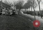Image of AEF artillerymen moving through a French Village France, 1918, second 44 stock footage video 65675076714