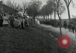 Image of AEF artillerymen moving through a French Village France, 1918, second 45 stock footage video 65675076714