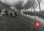 Image of AEF artillerymen moving through a French Village France, 1918, second 46 stock footage video 65675076714