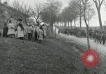 Image of AEF artillerymen moving through a French Village France, 1918, second 47 stock footage video 65675076714