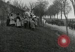Image of AEF artillerymen moving through a French Village France, 1918, second 48 stock footage video 65675076714