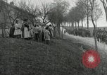 Image of AEF artillerymen moving through a French Village France, 1918, second 49 stock footage video 65675076714