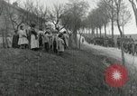 Image of AEF artillerymen moving through a French Village France, 1918, second 50 stock footage video 65675076714