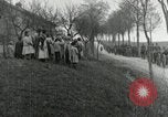 Image of AEF artillerymen moving through a French Village France, 1918, second 51 stock footage video 65675076714