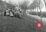 Image of AEF artillerymen moving through a French Village France, 1918, second 53 stock footage video 65675076714