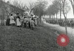 Image of AEF artillerymen moving through a French Village France, 1918, second 56 stock footage video 65675076714