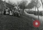 Image of AEF artillerymen moving through a French Village France, 1918, second 57 stock footage video 65675076714