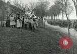 Image of AEF artillerymen moving through a French Village France, 1918, second 59 stock footage video 65675076714