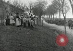 Image of AEF artillerymen moving through a French Village France, 1918, second 60 stock footage video 65675076714