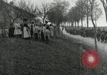 Image of AEF artillerymen moving through a French Village France, 1918, second 61 stock footage video 65675076714