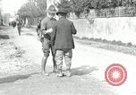 Image of US soldier teaches Asian man close order drill France, 1918, second 5 stock footage video 65675076719