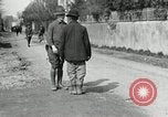 Image of US soldier teaches Asian man close order drill France, 1918, second 8 stock footage video 65675076719