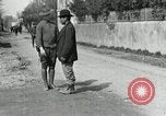 Image of US soldier teaches Asian man close order drill France, 1918, second 9 stock footage video 65675076719